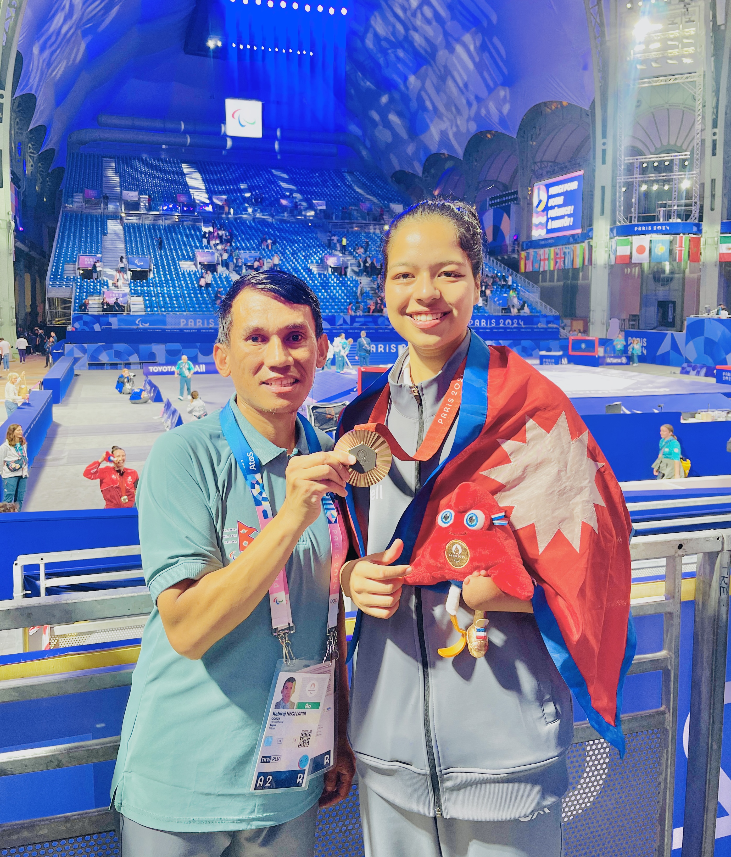 Palesha Goverdhan celebrates after winning a big medal for Nepal at the Paris 2024 Paralympics  at the Grand Palais in Paris.